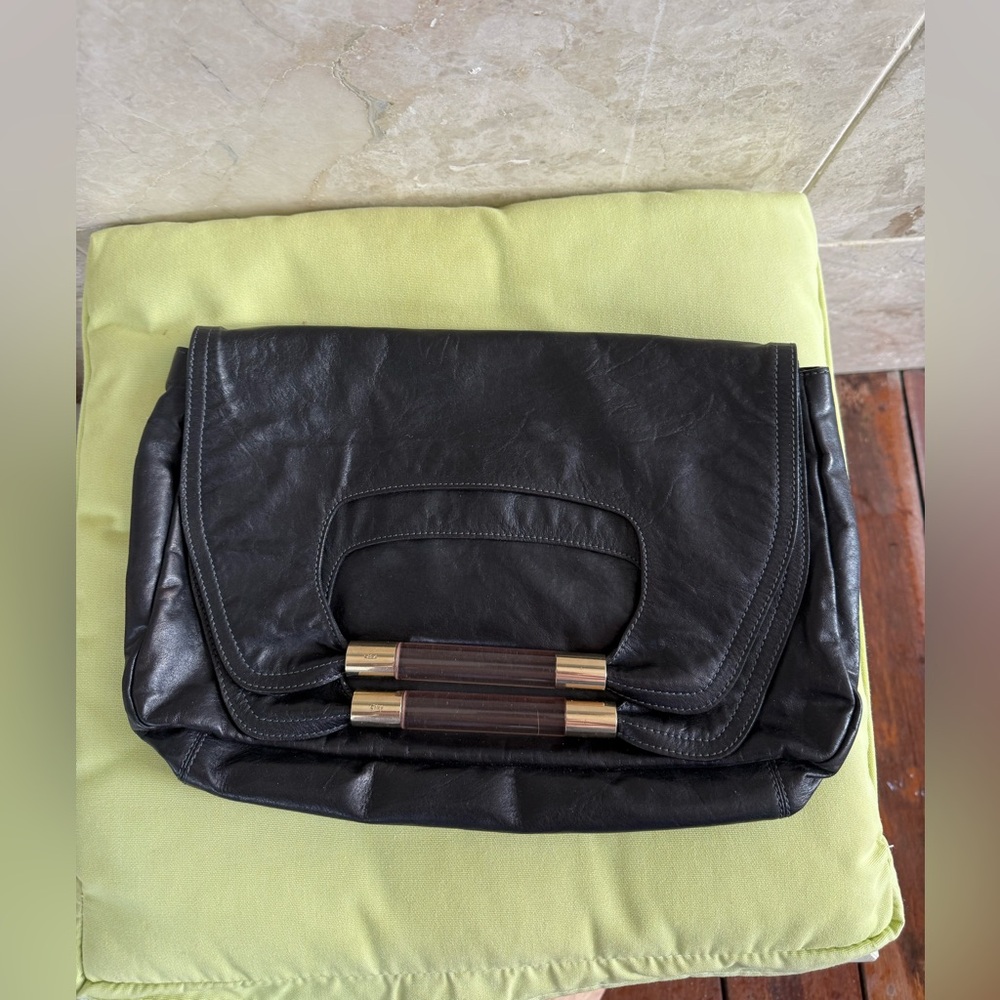 Chloe Black Nancy Leather Clutch with Lucite and Gold Handle.